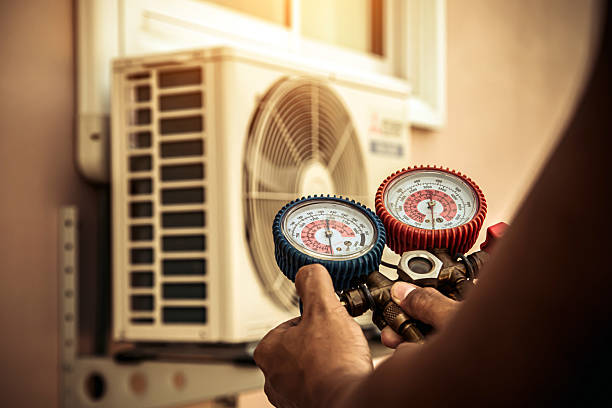Professional Heat Pump Repair technician working in Athens, IL